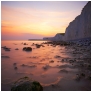 slides/Sunset Reflection.jpg sussex east birling.gap beach pools tide ocean coast beachy head lighthouse eastbourne rocks water ocean people person clouds storm cliffs pebbles red white blue seven sisters country park moon cresent ripples sand Sunset Reflection